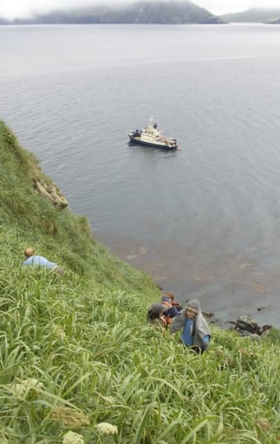 Ulak Island with MV Tiglax in background Picture