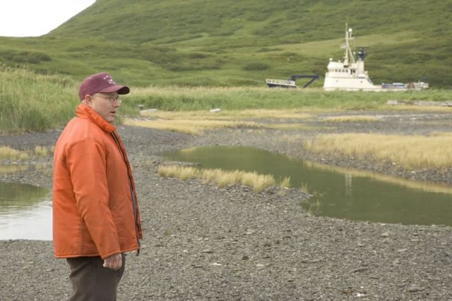 Captain Kevin Bell, with MV Tiglax in background Picture