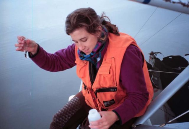 Shannon Nelson, USFWS Employee, Taking a Water Sample Picture