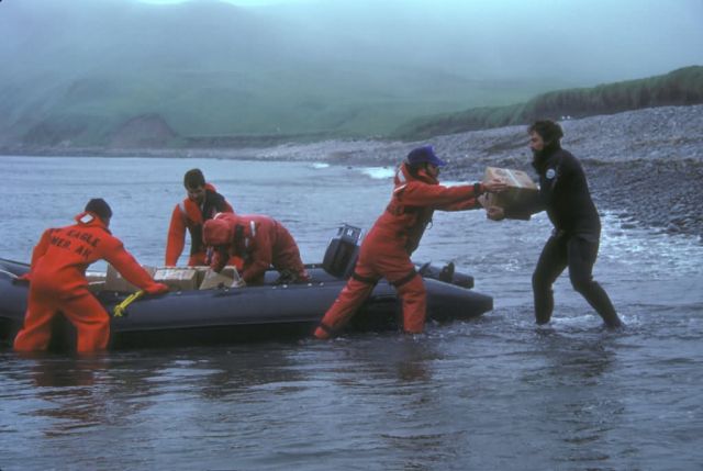 Alaska Maritime NWR crew offloads gear for a summer field camp, 1987 Picture