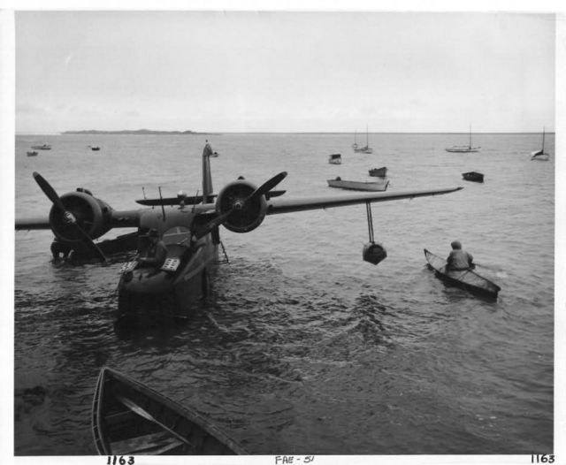 Clarence Rhode, Grumman Goose, Man in Kyak Picture