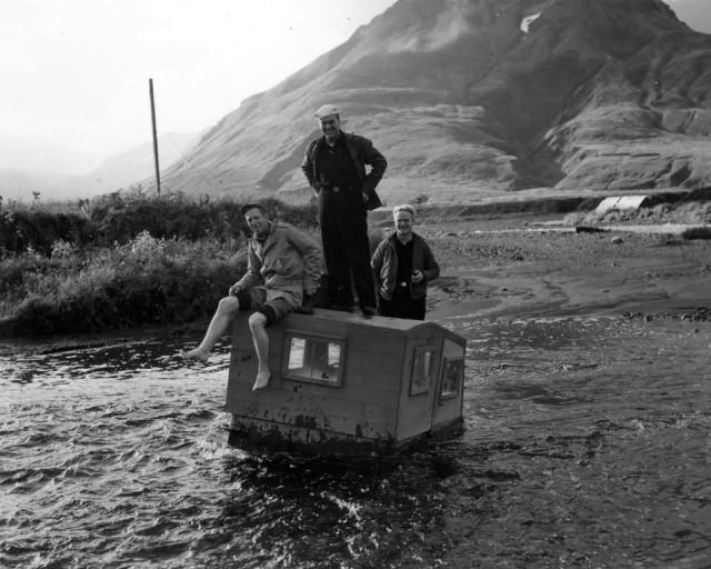 Three Servicemen on Jeep in Creek Picture