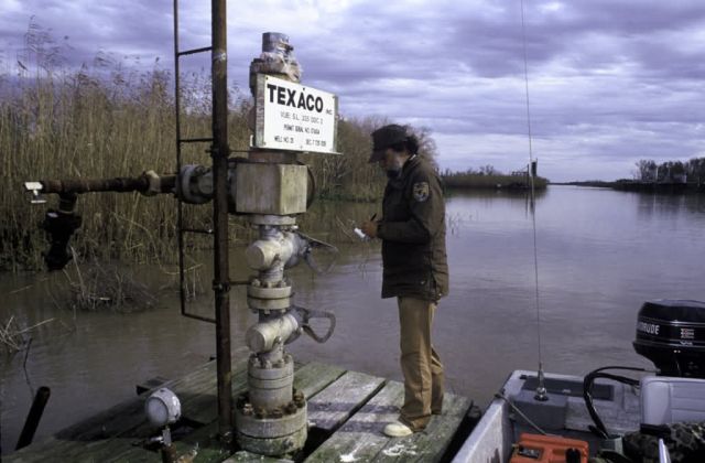 Checking Oil Well on Delta NWR Picture