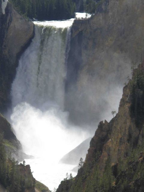 Upper falls of the Yellowstone River flexing its muscle with early summer snow- melt runoff. Picture