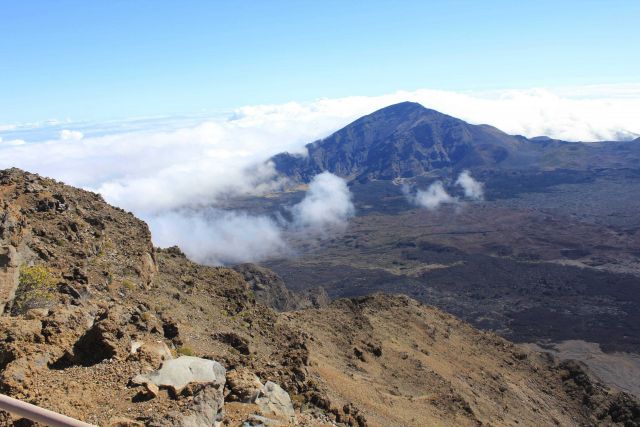 Haleakala Crater rising above the clouds. Picture