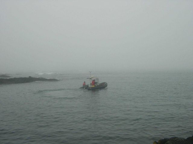Mapping team going to work on foggy grey day Picture
