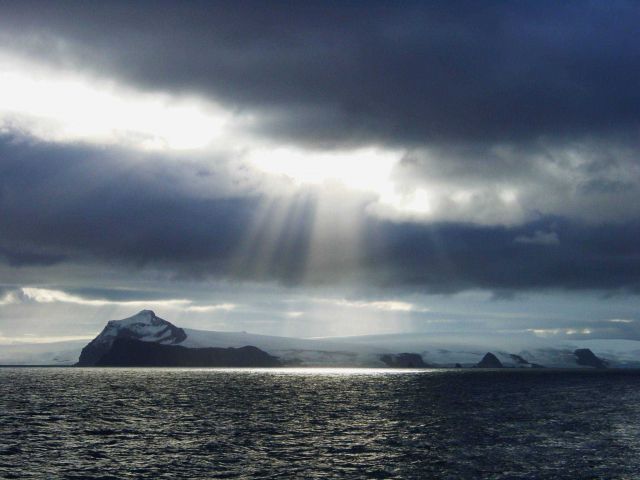 Crepuscular rays illuminating Antarctic Peninsula Picture