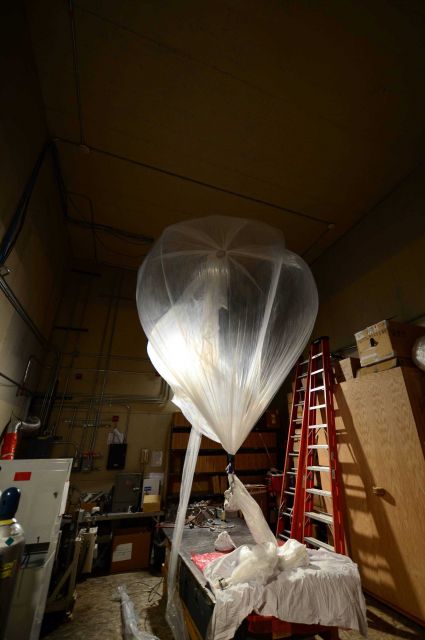 Ozonesonde balloon being readied for launch at balloon facility. Picture