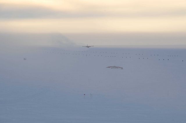 One of the first flights of the season landing at South Pole Station after the six-month night Picture