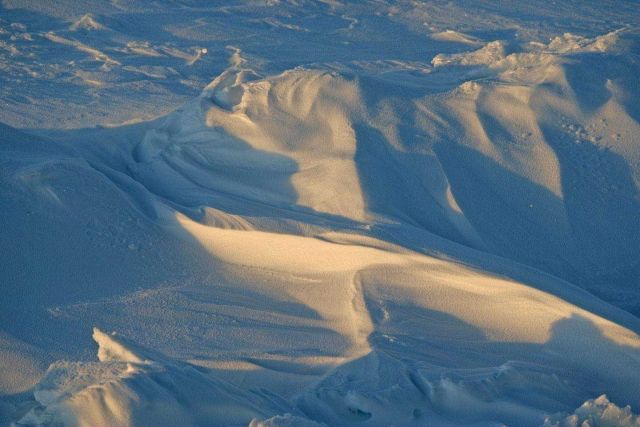 Wind-sculted snow patterns (sastrugi) Picture