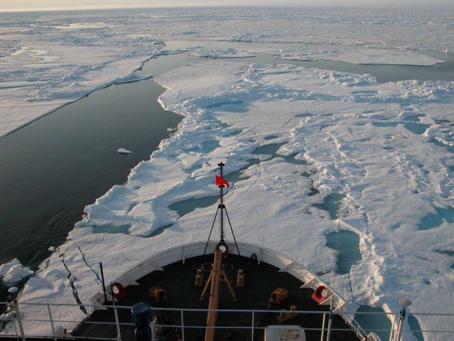 The USCG Icebreaker HEALY cuts through ice sheets in the Arctic Ocean to ferry scientists to various research locations where they will conduct scient Picture