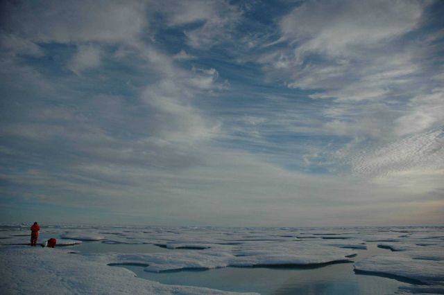 There are strange things done 'neath the midnight sun but the strangest of them all is Arctic scientists taking samples far, far from any solid land. Picture