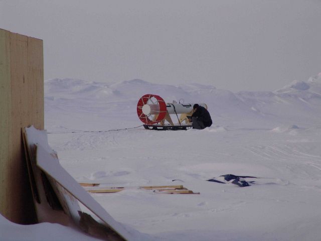 Preparing the electromagnetic induction bird for deployment by helicopter Picture