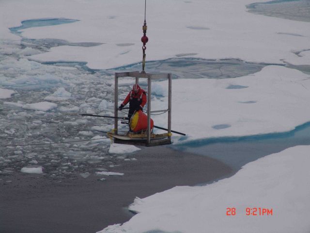 Transporting ice buoy to ice surface. Picture
