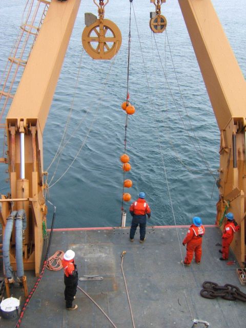 Deploying a current meter from the stern of the CG icebreaker HEALY. Picture