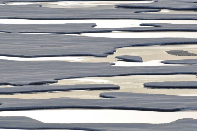 Parallel melt pools and ice floes provide a geometry lesson in near parallel features. Picture