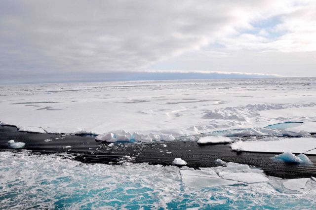 Wake of the HEALY causing ripples to form in the nilas ice at the edge of the pack ice. Picture
