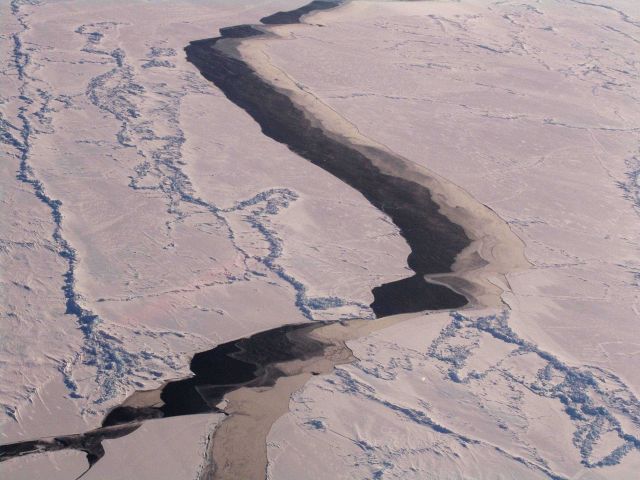 A lead through the ice pack with different types of ice as seen from a helicopter Picture