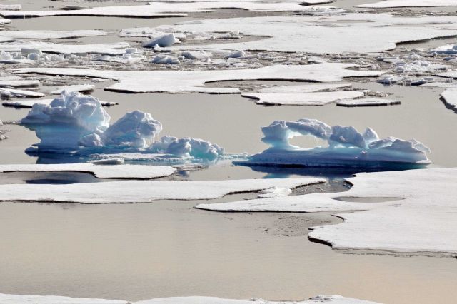 Picturesque remnant of multi-year ice amongst first year ice floes. Picture