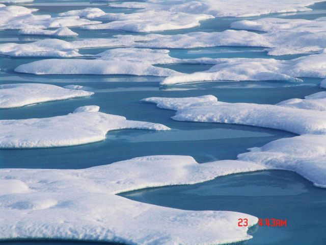 Aquamarine melt ponds in multi-year ice. Picture