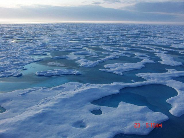 Aquamarine melt ponds in multi-year ice. Picture