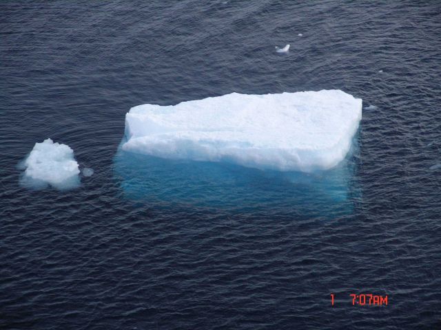 Large ice cube in open water Picture