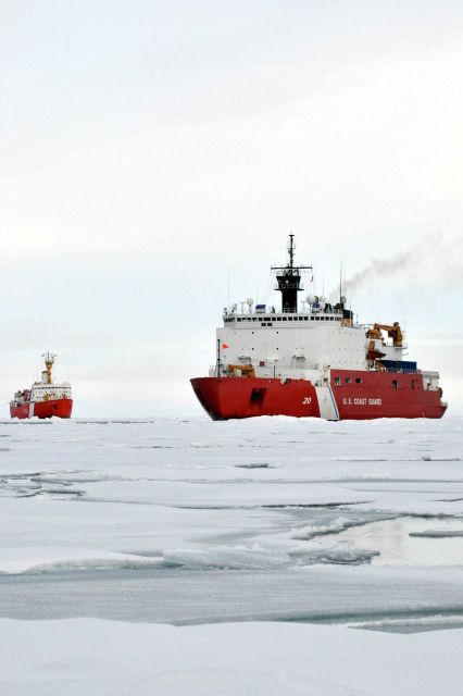 USCG icebreaker HEALY in relatively smooth first-year ice floes followed by the Canadian Coast Guard icebreaker LOUIS S Picture