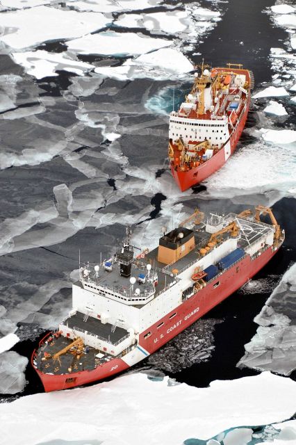 USCG icebreaker HEALY in relatively smooth first-year ice floes and nilas ice followed by the Canadian Coast Guard icebreaker LOUIS S Picture