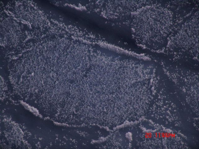 Ice crystals covering pancake ice. Picture