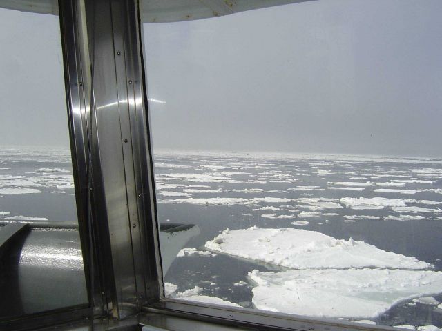 Ice floes seen through the bridge windows. Picture
