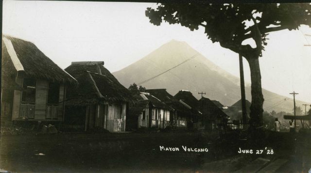 Mount Mayon on June 27, 1928, looming above Legaspi. Picture