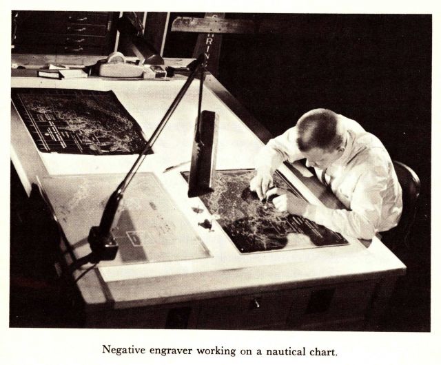 Negative engaver working on a nautical chart Picture