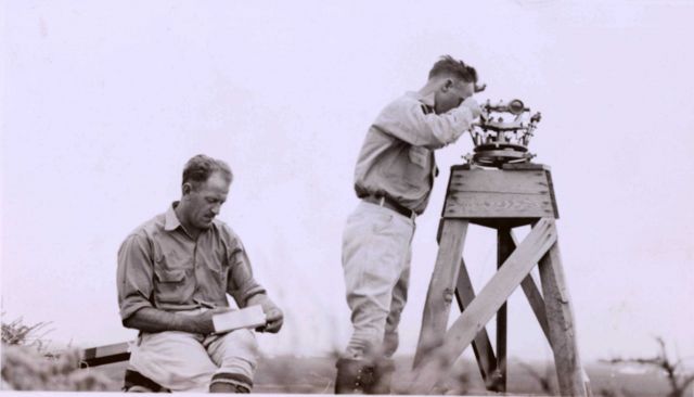 Oscar Risvold recording while Lieutenant William Tucker observses angles. Picture