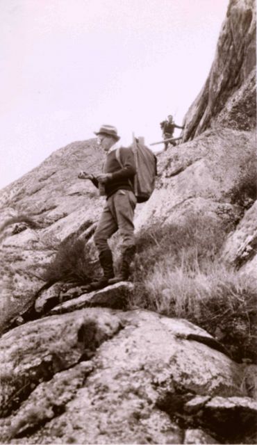 Lieutenant Charles Pierce getting his bearings on the way to a triangulation station in the Santa Lucia Mountains. Picture