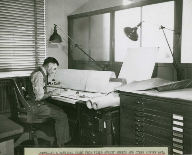 Compiling a nautical chart from field survey sheets and other data. Picture