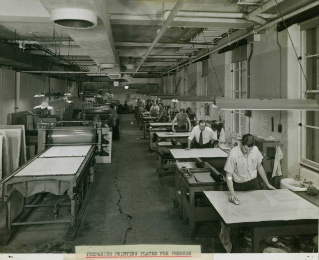 Preparing printing plates for presses. Picture