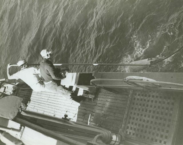 Recovering a buoy during wiredrag operations on the C&GS Ships WAINWRIGHT and HILGARD. Picture