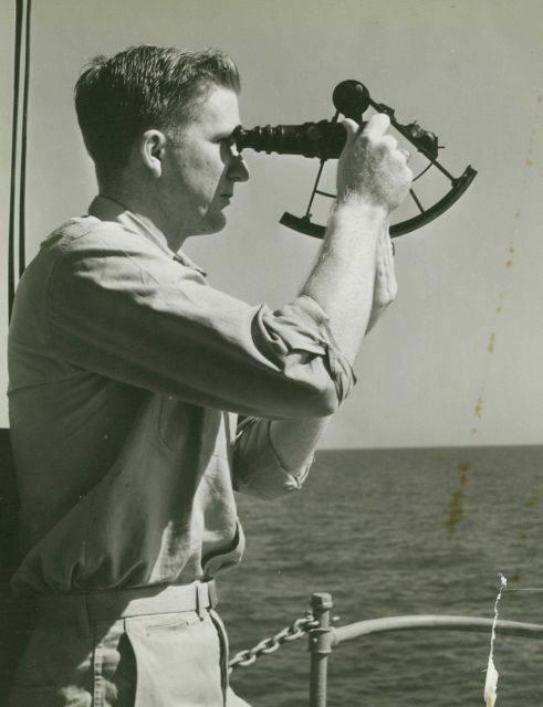 Checking for index error of sextant prior to beginning hydrographic survey operations. Picture