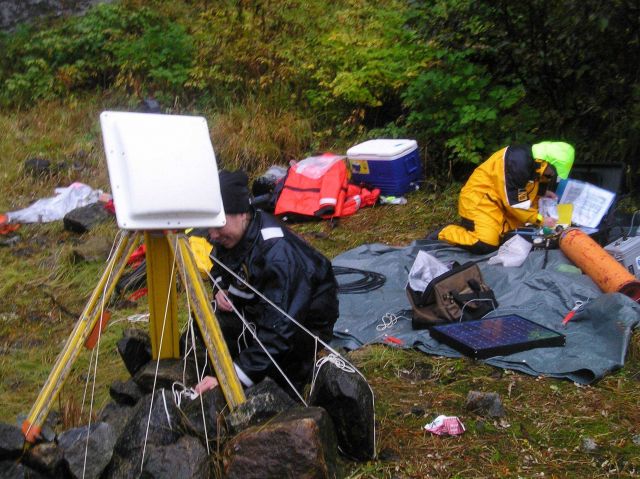 Setting up tide gauge equipment somewhere in Alaska Picture