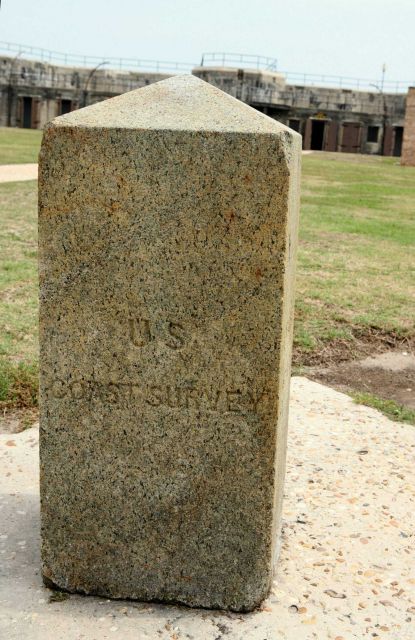 Granite obelisk used to designate one of the end points of the baseline measured by Alexander Dallas Bache on Dauphin Island in 1847 Picture