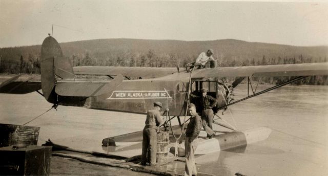 Fueling Wien Alaska Airlines float plane by hand Picture