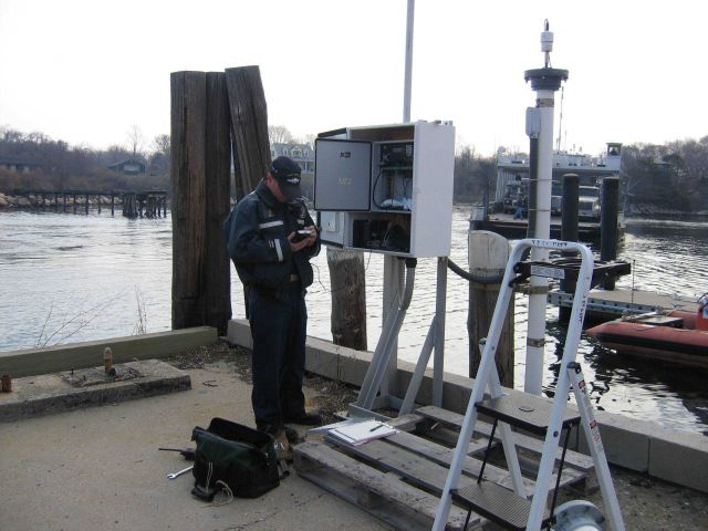 Level operations in support of Long Island Sound tide gauge. Picture