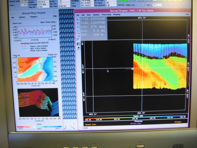 Computer displays associated with survey data acquisition and processing on the NOAA Ship THOMAS JEFFERSON. Picture