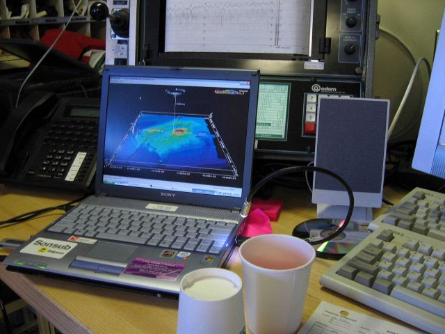 Computer displays associated with survey data acquisition and processing on the NOAA Ship THOMAS JEFFERSON. Picture