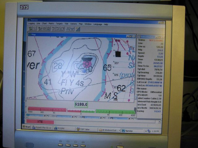 Computer displays associated with survey data acquisition and processing on the NOAA Ship THOMAS JEFFERSON. Picture