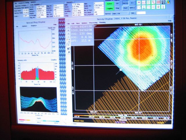 Computer displays associated with survey data acquisition and processing on the NOAA Ship THOMAS JEFFERSON. Picture