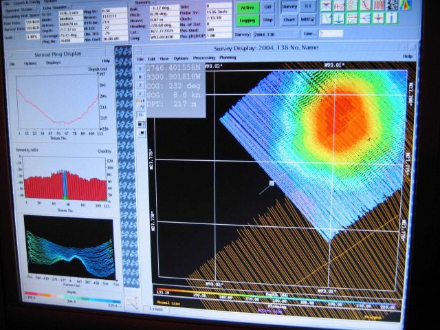 Computer displays associated with survey data acquisition and processing on the NOAA Ship THOMAS JEFFERSON. Picture