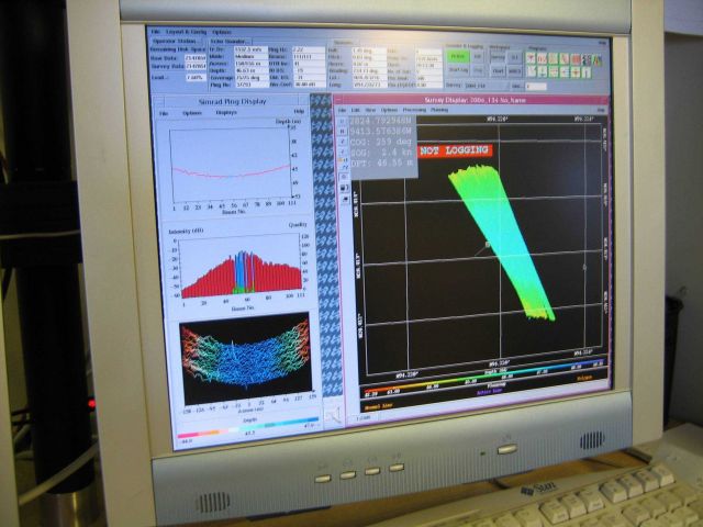 Computer displays associated with survey data acquisition and processing on the NOAA Ship THOMAS JEFFERSON. Picture