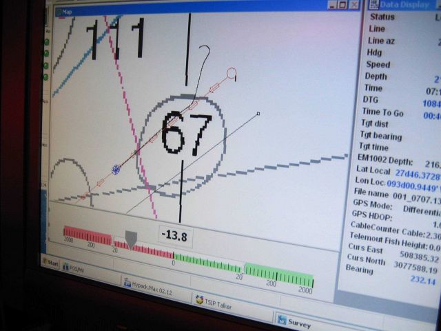 Computer displays associated with survey data acquisition and processing on the NOAA Ship THOMAS JEFFERSON. Picture
