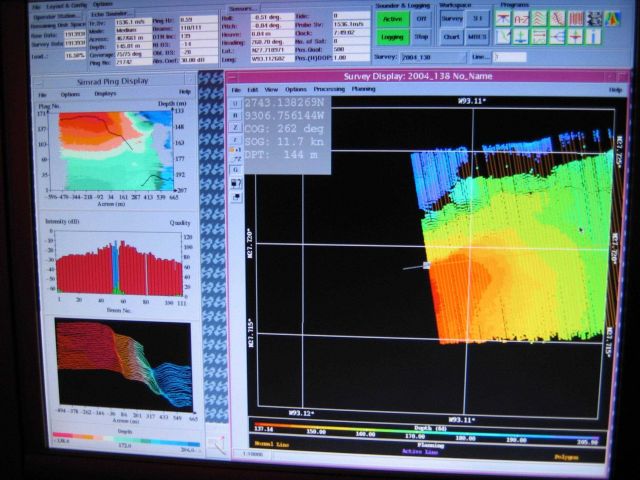Computer displays associated with survey data acquisition and processing on the NOAA Ship THOMAS JEFFERSON. Picture